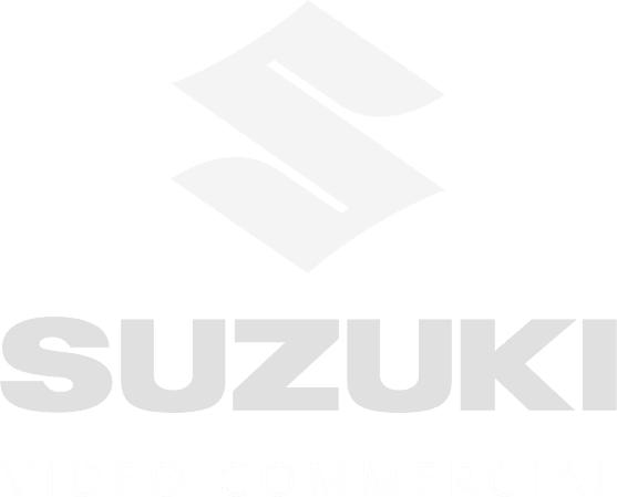 The image features the Suzuki logo, a stylized "S" shape, followed by the text "SUZUKI" in bold, capital letters. Below this, in smaller uppercase letters, are the words "VIDEO PRODUCTION SERVICE." The entire text and logo are presented in white.