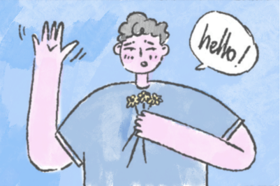 A cartoon character with short curly hair, a blue shirt, and pink skin is waving their hand while holding a small bouquet of yellow flowers in the other. A speech bubble above their head says "hello!" on a blue background. This adorable scene is part of the Acorn Autism initiative to spread awareness.