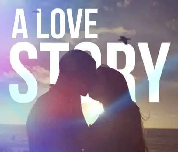 Silhouettes of a couple kissing against a sunset sky with a bird flying in the background. The video advertising includes large white text above them that reads "A LOVE STORY." The scene conveys romance and warmth with the sun casting a soft glow around the pair.