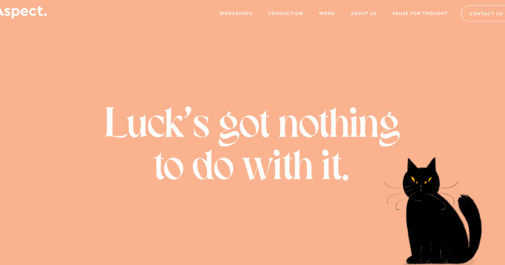 A Website With A Peach-Colored Background Features The Text &Quot;Luck'S Got Nothing To Do With It.&Quot; In The Center. A Black Cat With Yellow Eyes Sits On The Right Side Of The Text. The Top Menu, Highlighting Sections Like &Quot;Workshops&Quot; And &Quot;Contact Us,&Quot; Also Features A List Of Top 10 Video Production Companies. A website with a peach-colored background features the text "Luck's got nothing to do with it." in the center. A black cat with yellow eyes sits on the right side of the text. The top menu, highlighting sections like "Workshops" and "Contact Us," also features a list of Top 10 Video Production Companies.