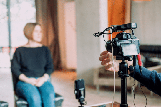 Corporate video production of a testimonial talking head video
