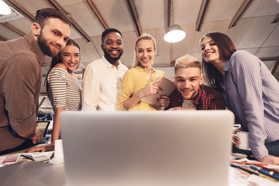 group of people watching a promotional video